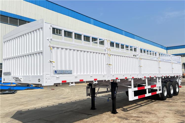 TITAN Tri Axle 60 Ton Fence Cargo Semi Trailer for Sale In Guinea - Gjysmë rimorkio bagëtish: foto 2 TITAN Tri Axle 60 Ton Fence Cargo Semi Trailer for Sale In Guinea - Gjysmë rimorkio bagëtish: foto 2