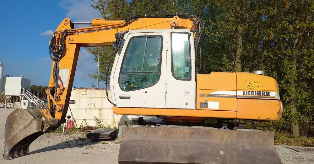 Liebherr A316 - Ekskavator me goma: foto 1 Liebherr A316 - Ekskavator me goma: foto 1