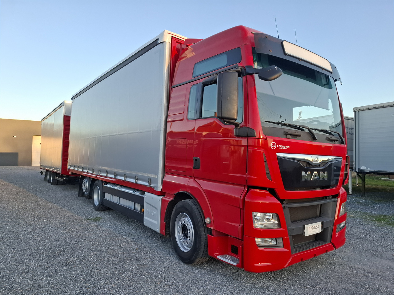 MAN TGX 26.440 E6 + SCHMITZ - Kamion me tendë: foto 4 MAN TGX 26.440 E6 + SCHMITZ - Kamion me tendë: foto 4