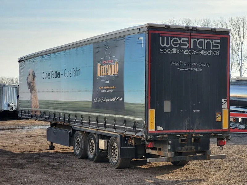 Krone SD Forklift Lift+Lenkachse Kooiaap Palettenkasten SAF Sliding Roof 2015 - Gjysmë rimorkio me tendë: foto 3 Krone SD Forklift Lift+Lenkachse Kooiaap Palettenkasten SAF Sliding Roof 2015 - Gjysmë rimorkio me tendë: foto 3