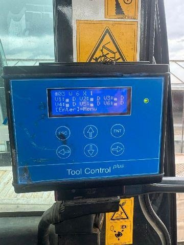 Ekskavator me zinxhirë Komatsu 138US-11: foto 6 Ekskavator me zinxhirë Komatsu 138US-11: foto 6