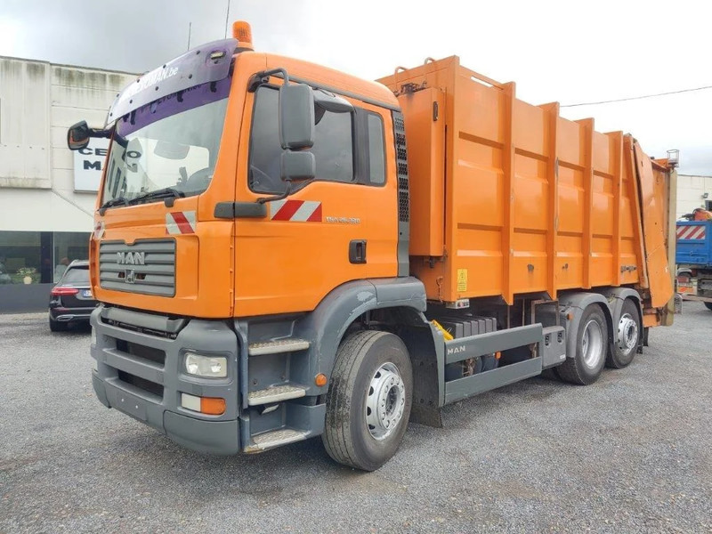 MAN TGA 26.320 6x2 garbage truck ZOELLER - Kamion mbeturinash: foto 1 MAN TGA 26.320 6x2 garbage truck ZOELLER - Kamion mbeturinash: foto 1