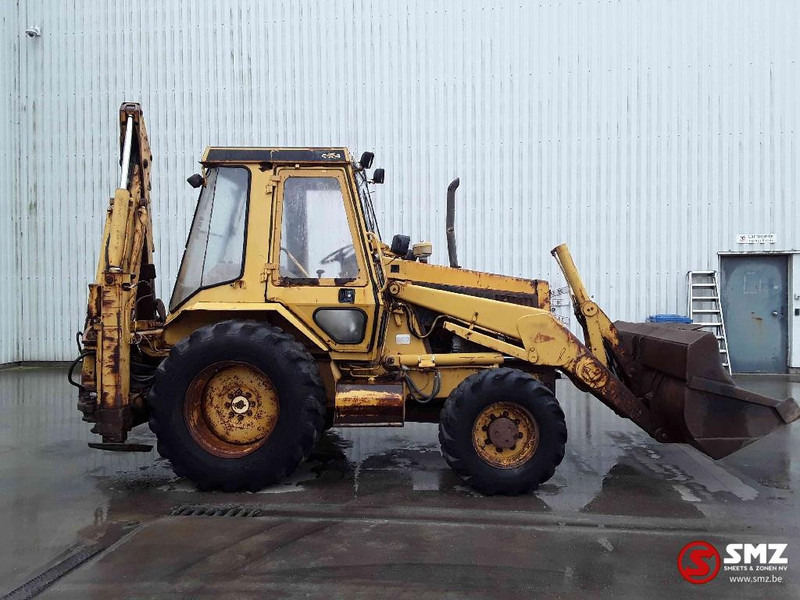 Caterpillar 428 - Fadromë me shkarkim nga prapa: foto 4 Caterpillar 428 - Fadromë me shkarkim nga prapa: foto 4