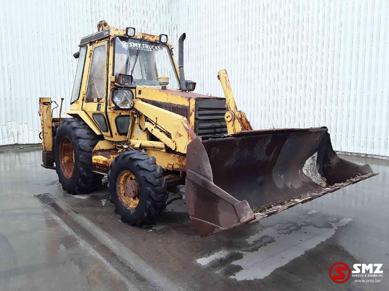 Caterpillar 428 - Fadromë me shkarkim nga prapa: foto 1 Caterpillar 428 - Fadromë me shkarkim nga prapa: foto 1