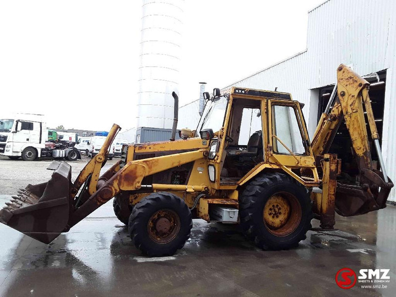 Caterpillar 428 - Fadromë me shkarkim nga prapa: foto 5 Caterpillar 428 - Fadromë me shkarkim nga prapa: foto 5