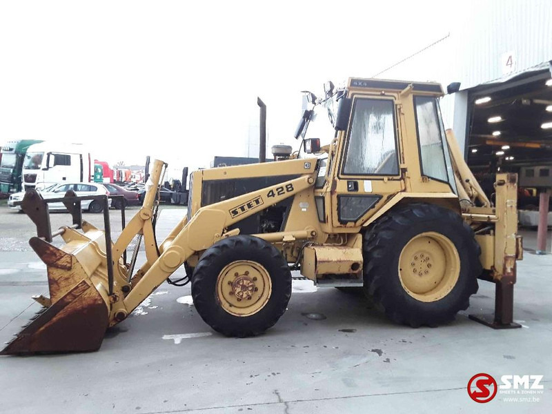 Caterpillar 428 - Fadromë me shkarkim nga prapa: foto 5 Caterpillar 428 - Fadromë me shkarkim nga prapa: foto 5