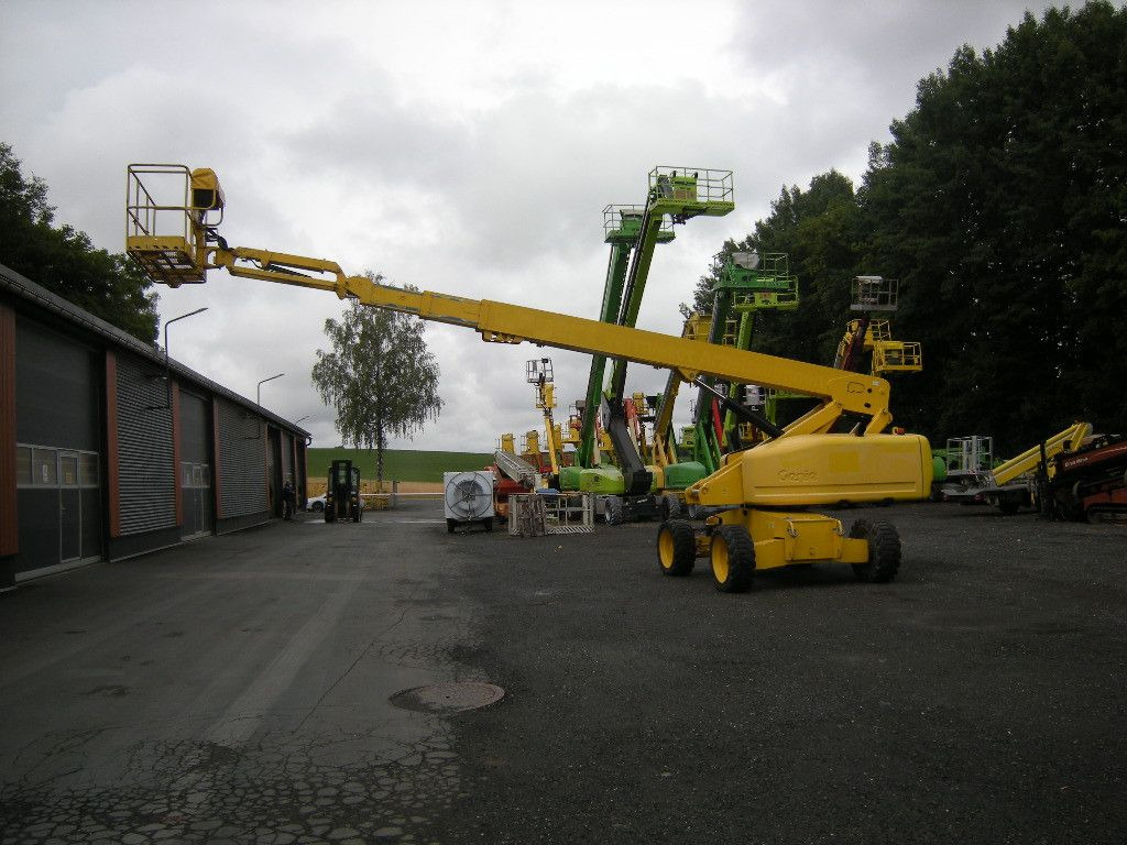 Genie Arbeitsbühne Genie S65, AH 22m - Platformë ajrore e montuar në kamion: foto 4 Genie Arbeitsbühne Genie S65, AH 22m - Platformë ajrore e montuar në kamion: foto 4