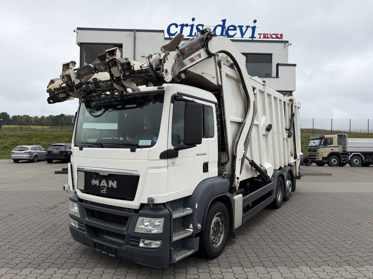 MAN TGS 26.320 6x2 BL Faun Frontlader - Kamion mbeturinash: foto 1 MAN TGS 26.320 6x2 BL Faun Frontlader - Kamion mbeturinash: foto 1