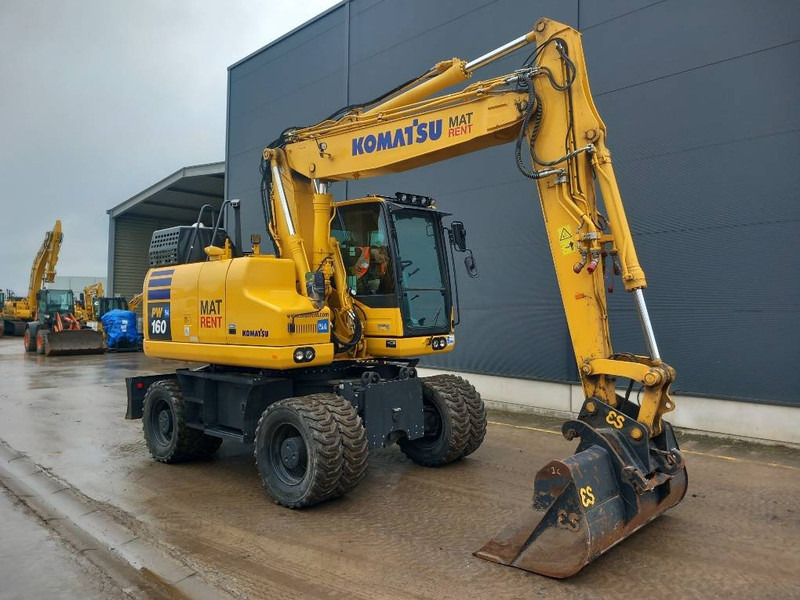 Komatsu PW160-11E0 - Ekskavator me goma: foto 1 Komatsu PW160-11E0 - Ekskavator me goma: foto 1