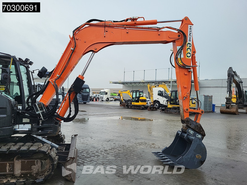 Ekskavator me zinxhirë Hitachi ZX85 USB-5A: foto 8 Ekskavator me zinxhirë Hitachi ZX85 USB-5A: foto 8