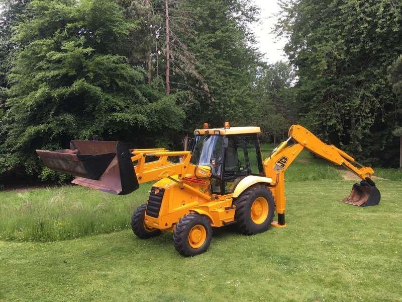 Jcb 3CX - Fadromë me shkarkim nga prapa: foto 1 Jcb 3CX - Fadromë me shkarkim nga prapa: foto 1