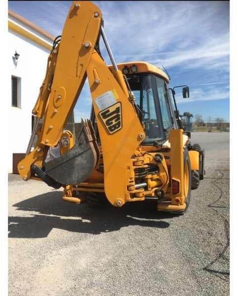 Jcb 3CX - Fadromë me shkarkim nga prapa: foto 5 Jcb 3CX - Fadromë me shkarkim nga prapa: foto 5