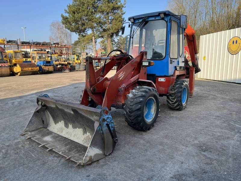 Kubota R520 - Fadromë me shkarkim nga prapa: foto 2 Kubota R520 - Fadromë me shkarkim nga prapa: foto 2