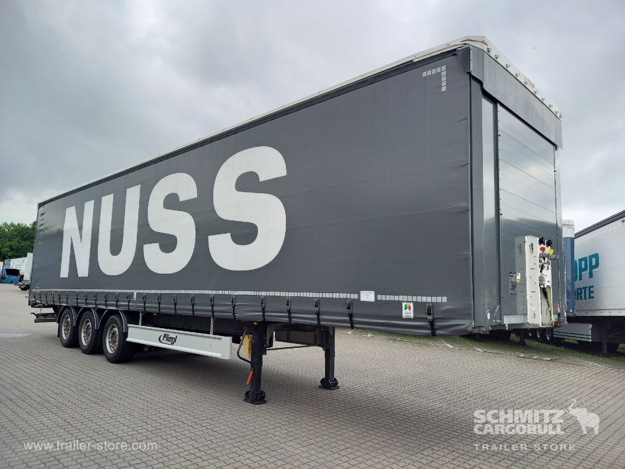 FLIEGL Auflieger Curtainsider Coil - Gjysmë rimorkio me tendë: foto 1 FLIEGL Auflieger Curtainsider Coil - Gjysmë rimorkio me tendë: foto 1