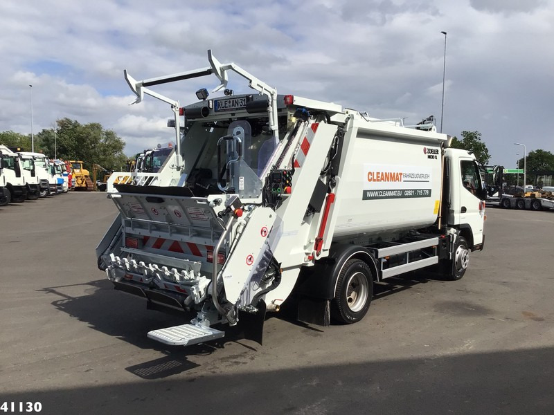 FUSO Canter 9C18 Zoeller 7m3 - Kamion mbeturinash: foto 5 FUSO Canter 9C18 Zoeller 7m3 - Kamion mbeturinash: foto 5
