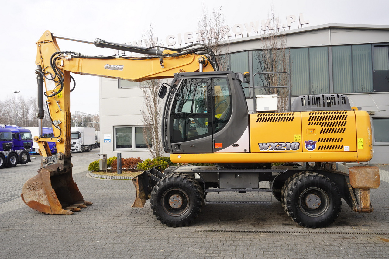 CASE WX218 / 23t wheeled excavator / 3 times folding arm - Ekskavator me goma: foto 1 CASE WX218 / 23t wheeled excavator / 3 times folding arm - Ekskavator me goma: foto 1
