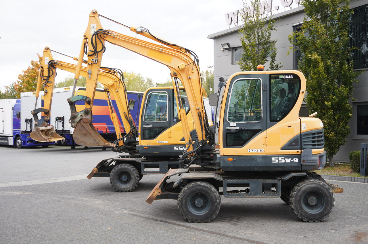 Hyundai Robex 55W-9 Wheeled Excavator 5.5t / 2pcs - Miniekskavator: foto 1 Hyundai Robex 55W-9 Wheeled Excavator 5.5t / 2pcs - Miniekskavator: foto 1