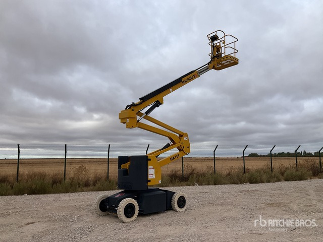 2004 Haulotte HA15I 2WD Electric Articulating Boom Lift - Krah me çernjerë: foto 1 2004 Haulotte HA15I 2WD Electric Articulating Boom Lift - Krah me çernjerë: foto 1