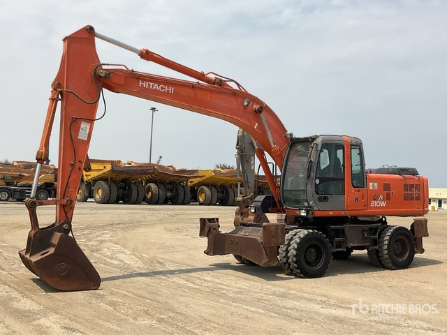 2005 Hitachi ZX210W - Ekskavator me goma: foto 1 2005 Hitachi ZX210W - Ekskavator me goma: foto 1