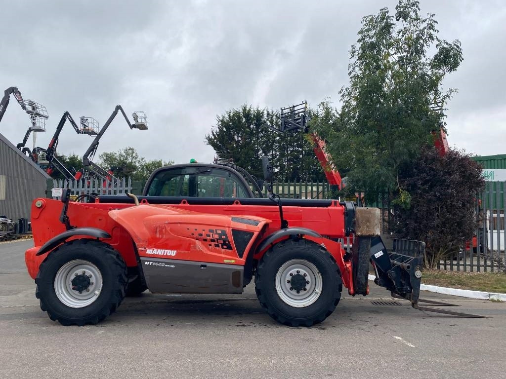 Manitou MT 1440 - Ekskavator teleskopik: foto 1 Manitou MT 1440 - Ekskavator teleskopik: foto 1