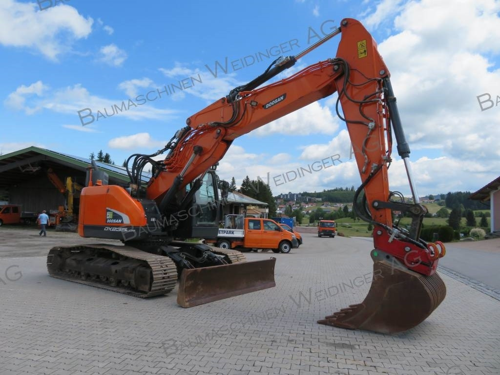 Doosan DX 235 LCR-5 - Ekskavator me zinxhirë: foto 2 Doosan DX 235 LCR-5 - Ekskavator me zinxhirë: foto 2