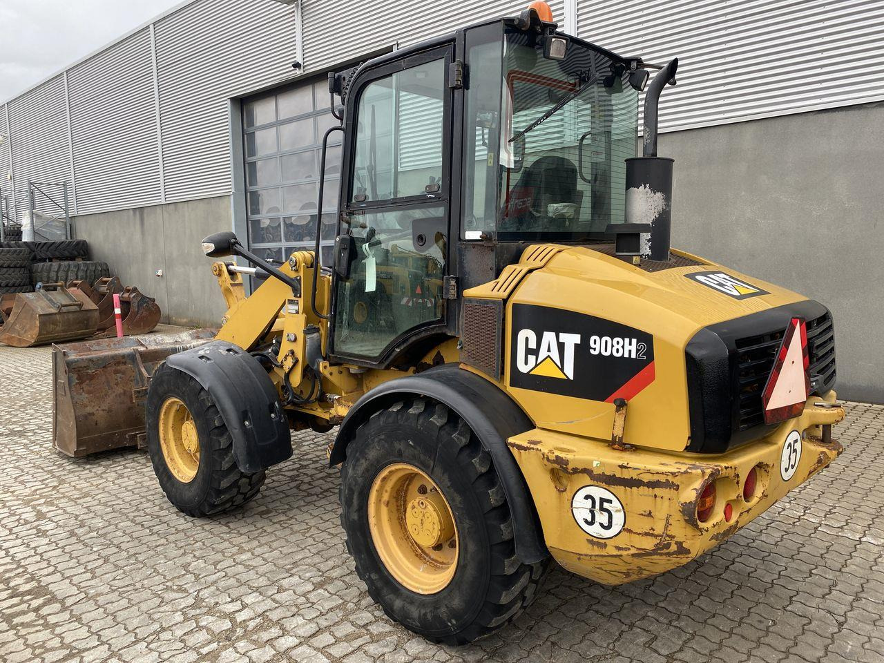 Caterpillar 908 H2 - Ngarkues i artikuluar: foto 2 Caterpillar 908 H2 - Ngarkues i artikuluar: foto 2