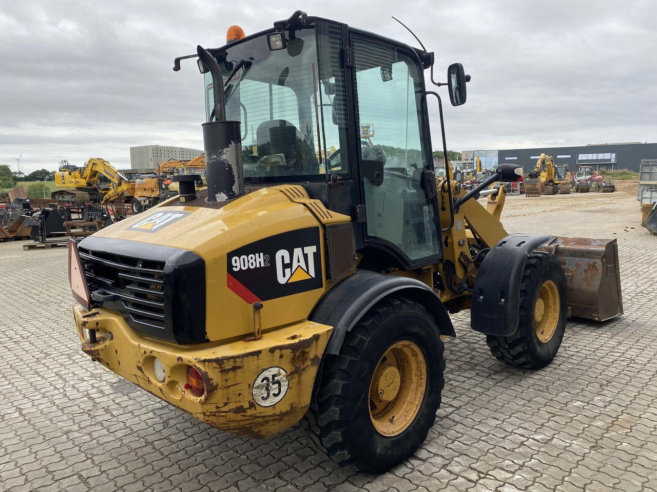 Caterpillar 908 H2 - Ngarkues i artikuluar: foto 4 Caterpillar 908 H2 - Ngarkues i artikuluar: foto 4