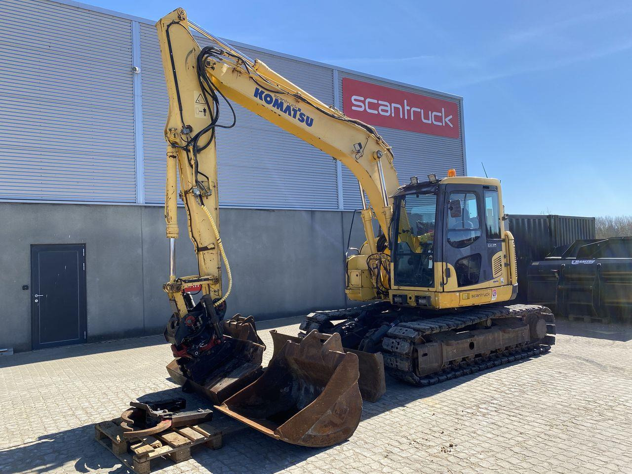 Komatsu PC138US-8 - Ekskavator me zinxhirë: foto 1 Komatsu PC138US-8 - Ekskavator me zinxhirë: foto 1