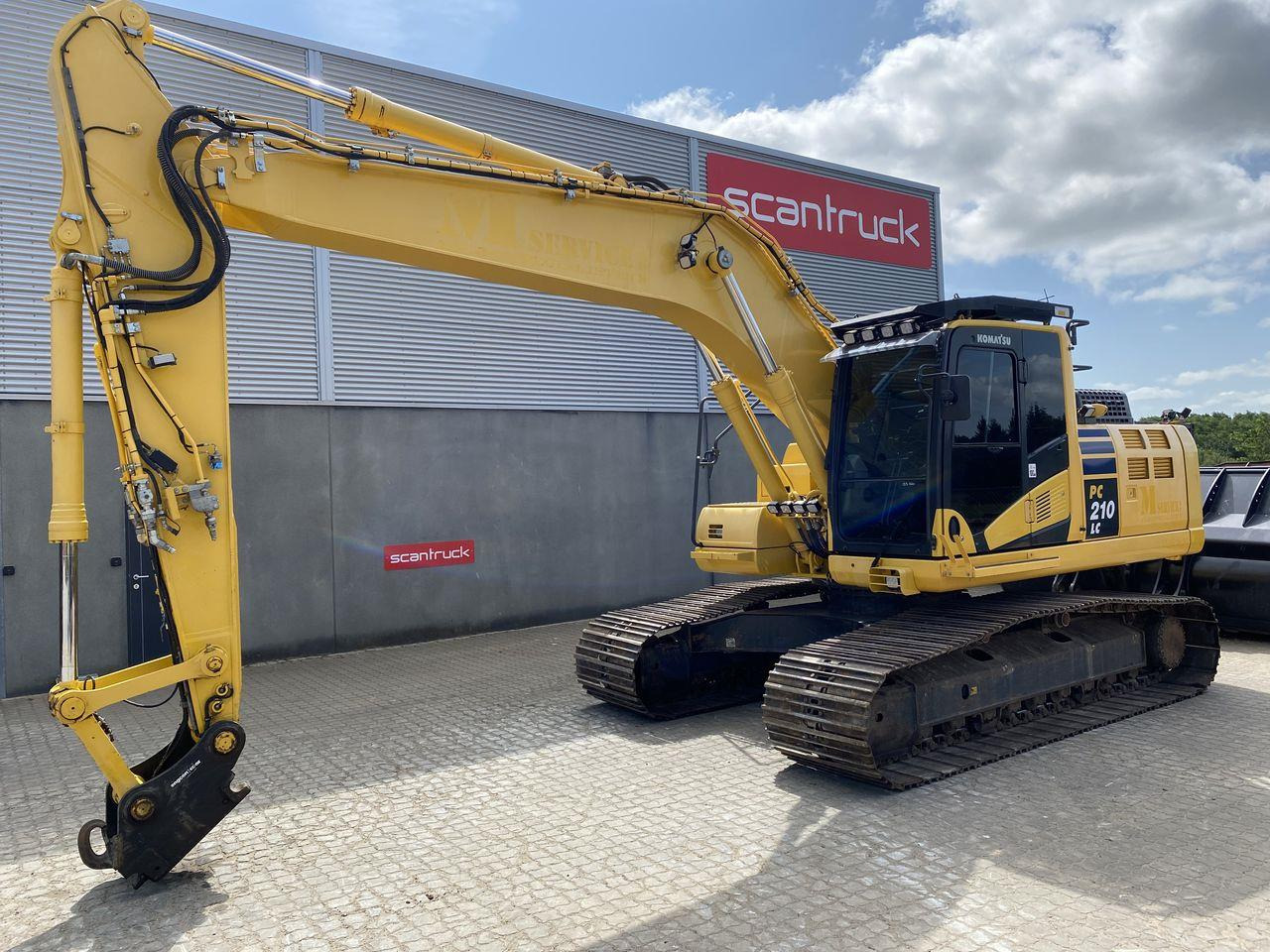 Komatsu PC210LC-11 - Ekskavator me zinxhirë: foto 1 Komatsu PC210LC-11 - Ekskavator me zinxhirë: foto 1