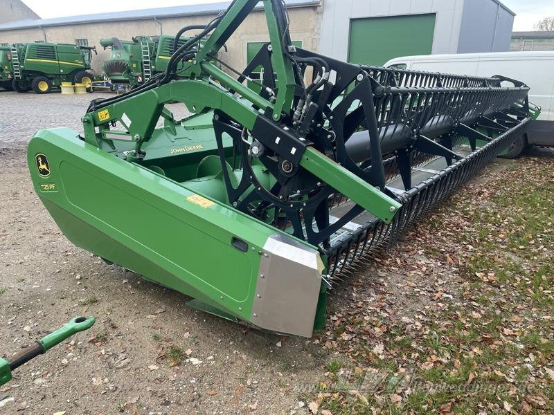 John Deere T670 i - Autokombajnë: foto 2 John Deere T670 i - Autokombajnë: foto 2