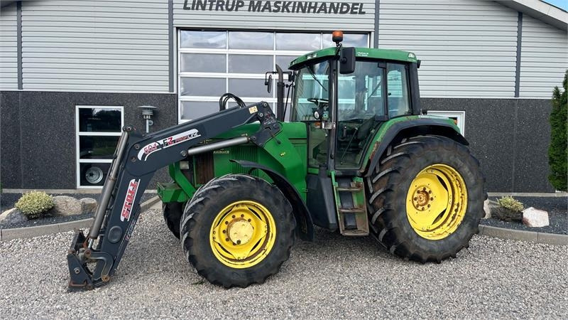 John Deere 6910 Auto Quad II-TLS Med frontlæsser - Traktor: foto 1 John Deere 6910 Auto Quad II-TLS Med frontlæsser - Traktor: foto 1