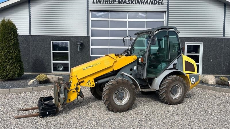 Ngarkues i artikuluar Kramer 750T Allrad med pallegafler og adabter. Med telesk: foto 1