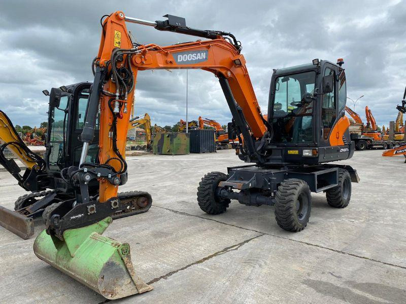 Doosan DX57W - Ekskavator me goma: foto 1 Doosan DX57W - Ekskavator me goma: foto 1