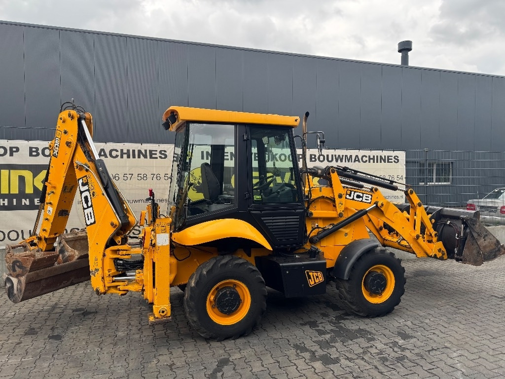JCB 2 CX - Fadromë me shkarkim nga prapa: foto 1 JCB 2 CX - Fadromë me shkarkim nga prapa: foto 1