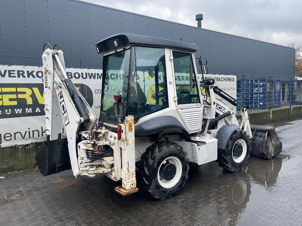 JCB 2 CX - Fadromë me shkarkim nga prapa: foto 1 JCB 2 CX - Fadromë me shkarkim nga prapa: foto 1