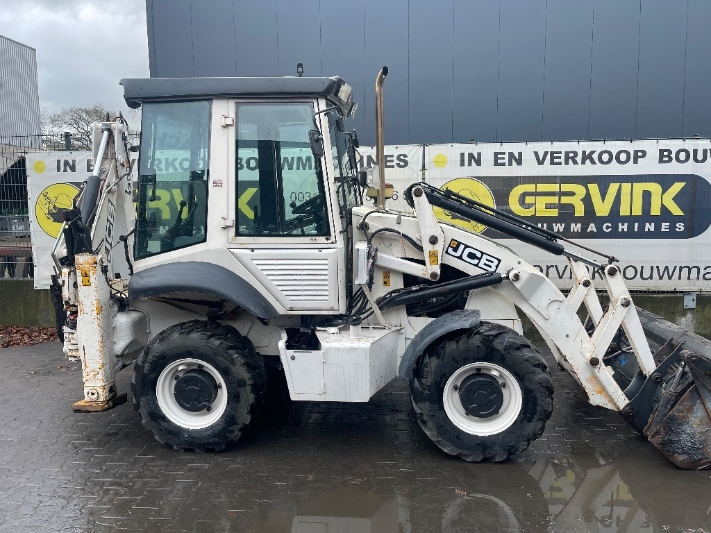 JCB 2 CX - Fadromë me shkarkim nga prapa: foto 2 JCB 2 CX - Fadromë me shkarkim nga prapa: foto 2