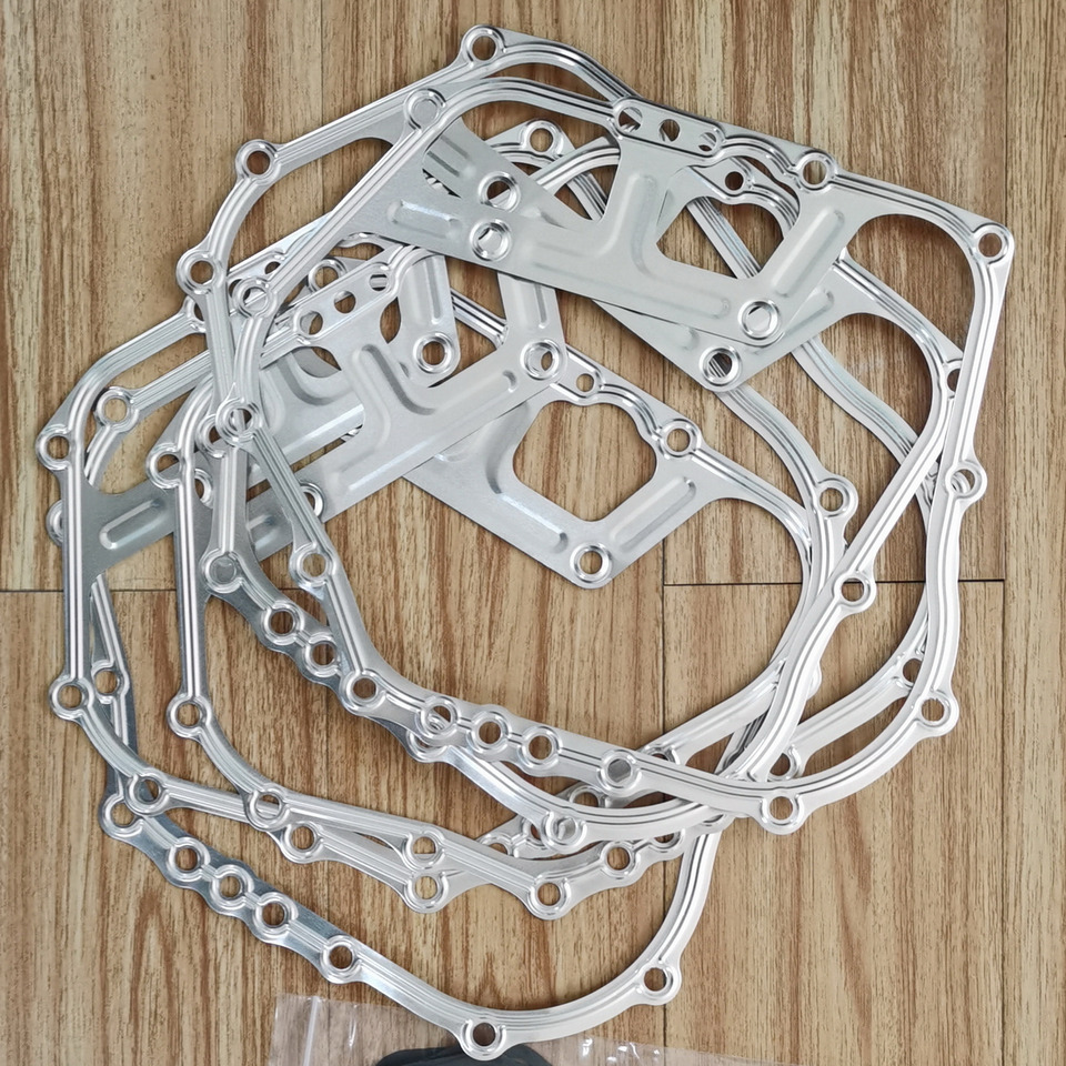 KOOP Genuine Crankcase Side Cover Gasket for China Loader - Karteri për Fadrom me goma: foto 1 KOOP Genuine Crankcase Side Cover Gasket for China Loader - Karteri për Fadrom me goma: foto 1