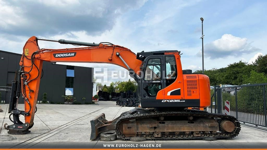 Doosan Kettenbagger DX 235 LCR-5, hyd. SW OilQuick 70-55 - Ekskavator me zinxhirë: foto 3 Doosan Kettenbagger DX 235 LCR-5, hyd. SW OilQuick 70-55 - Ekskavator me zinxhirë: foto 3
