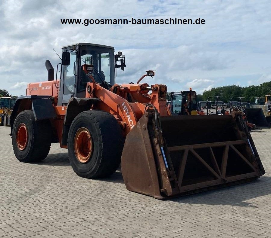 Hitachi LX 210 E - Fadrom me goma: foto 1 Hitachi LX 210 E - Fadrom me goma: foto 1