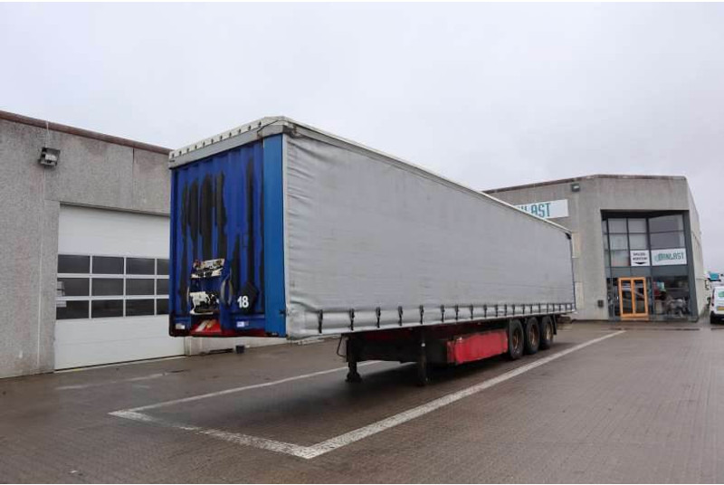 Krone Curtainsider/Planenauflieger/Gardin - Gjysmë rimorkio me tendë: foto 1 Krone Curtainsider/Planenauflieger/Gardin - Gjysmë rimorkio me tendë: foto 1