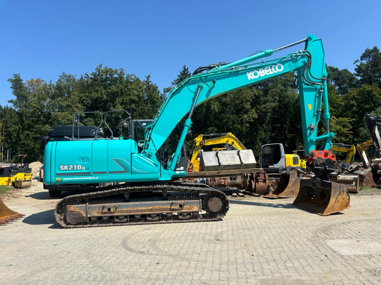 KOBELCO SK 210 NLC-9 - Ekskavator me zinxhirë: foto 2 KOBELCO SK 210 NLC-9 - Ekskavator me zinxhirë: foto 2