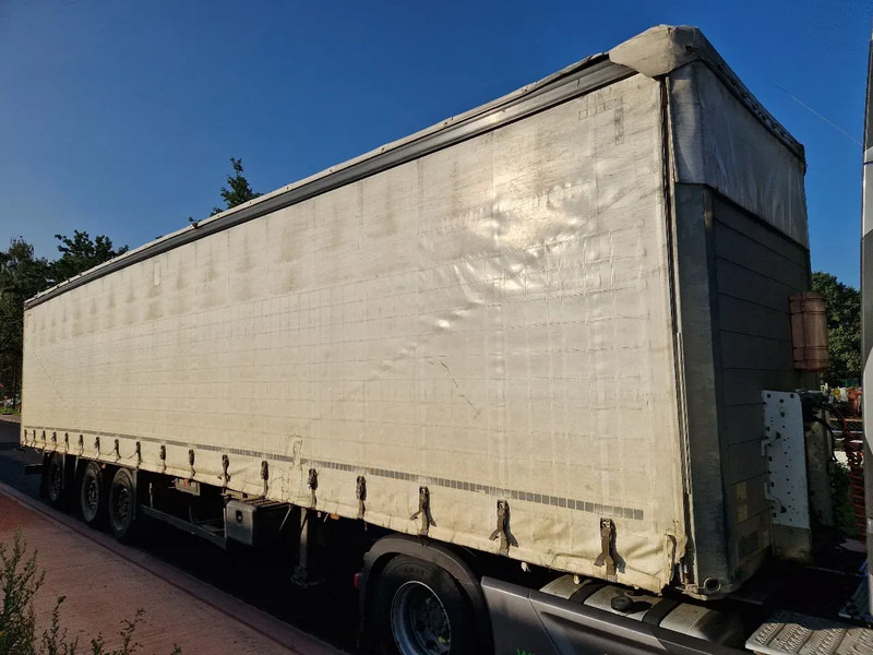 Schmitz Cargobull SCB*S3T / HUBDACH / TOIT LEVANT / HEFDAK /DRAAIAS -ESSIEUX VIRREUR - DREHACHSE - Gjysmë rimorkio me tendë: foto 2 Schmitz Cargobull SCB*S3T / HUBDACH / TOIT LEVANT / HEFDAK /DRAAIAS -ESSIEUX VIRREUR - DREHACHSE - Gjysmë rimorkio me tendë: foto 2
