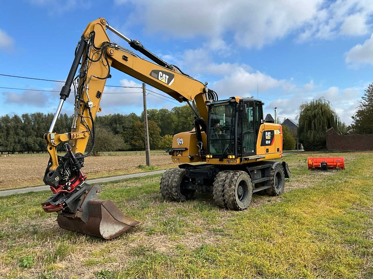 Caterpillar M314F - Ekskavator me goma: foto 1 Caterpillar M314F - Ekskavator me goma: foto 1