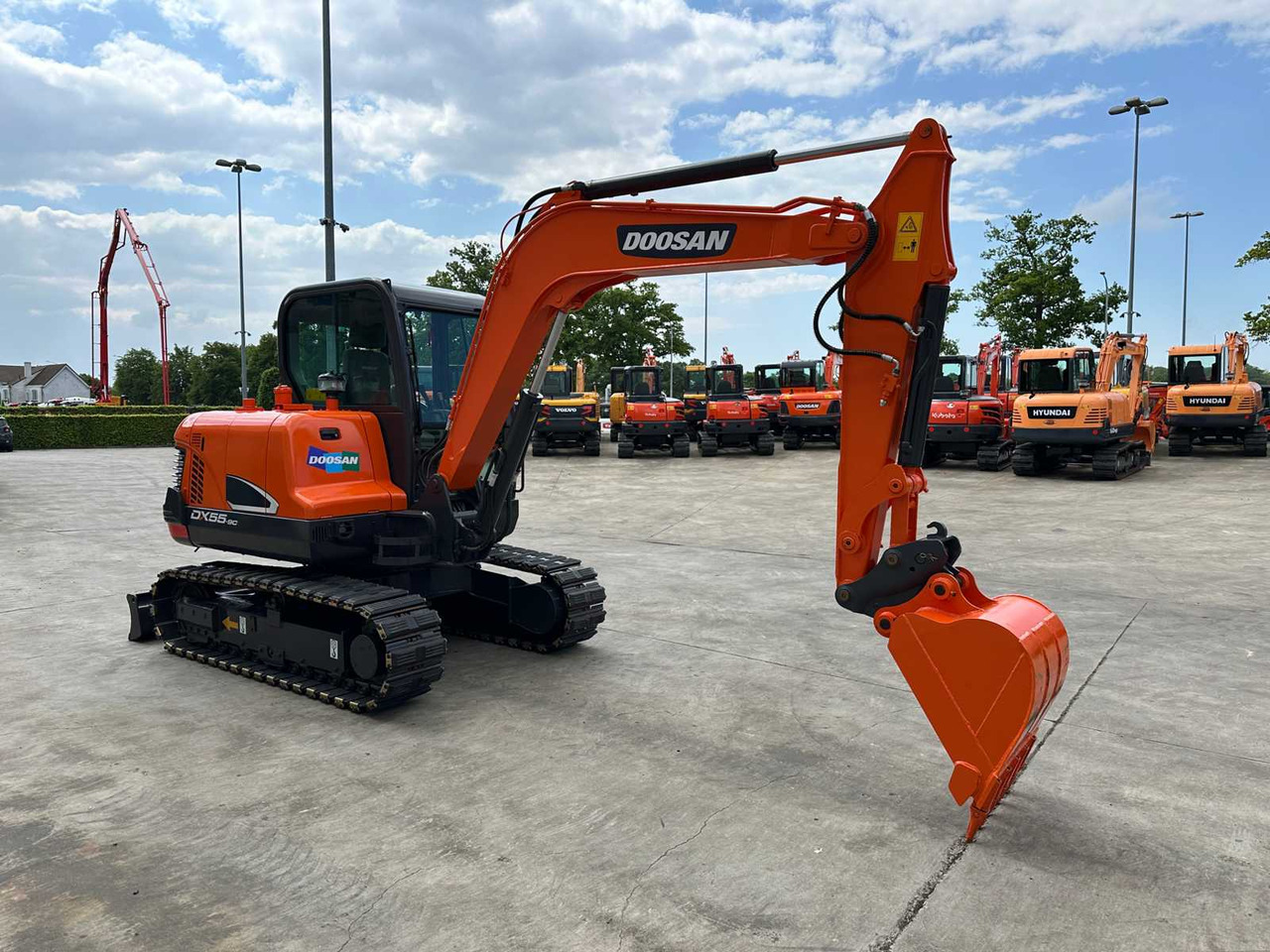 Doosan DX55-9C - Ekskavator me zinxhirë: foto 3 Doosan DX55-9C - Ekskavator me zinxhirë: foto 3