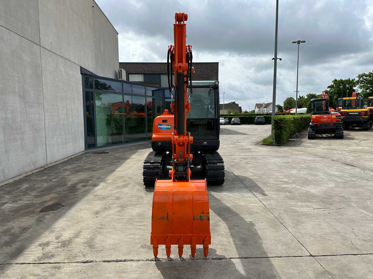 Doosan DX55-9C - Ekskavator me zinxhirë: foto 2 Doosan DX55-9C - Ekskavator me zinxhirë: foto 2