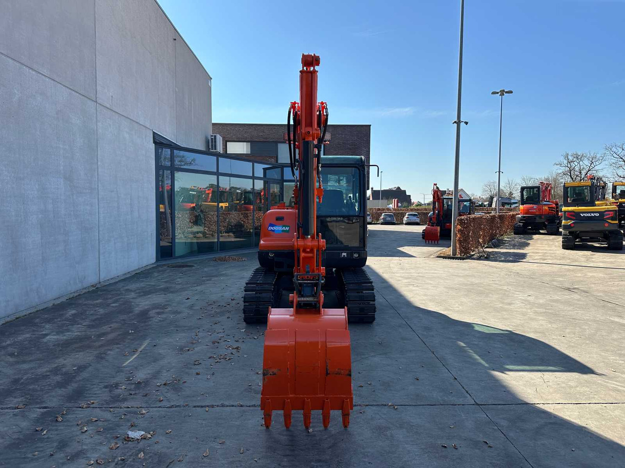 Doosan DX55-9C - Ekskavator me zinxhirë: foto 2 Doosan DX55-9C - Ekskavator me zinxhirë: foto 2
