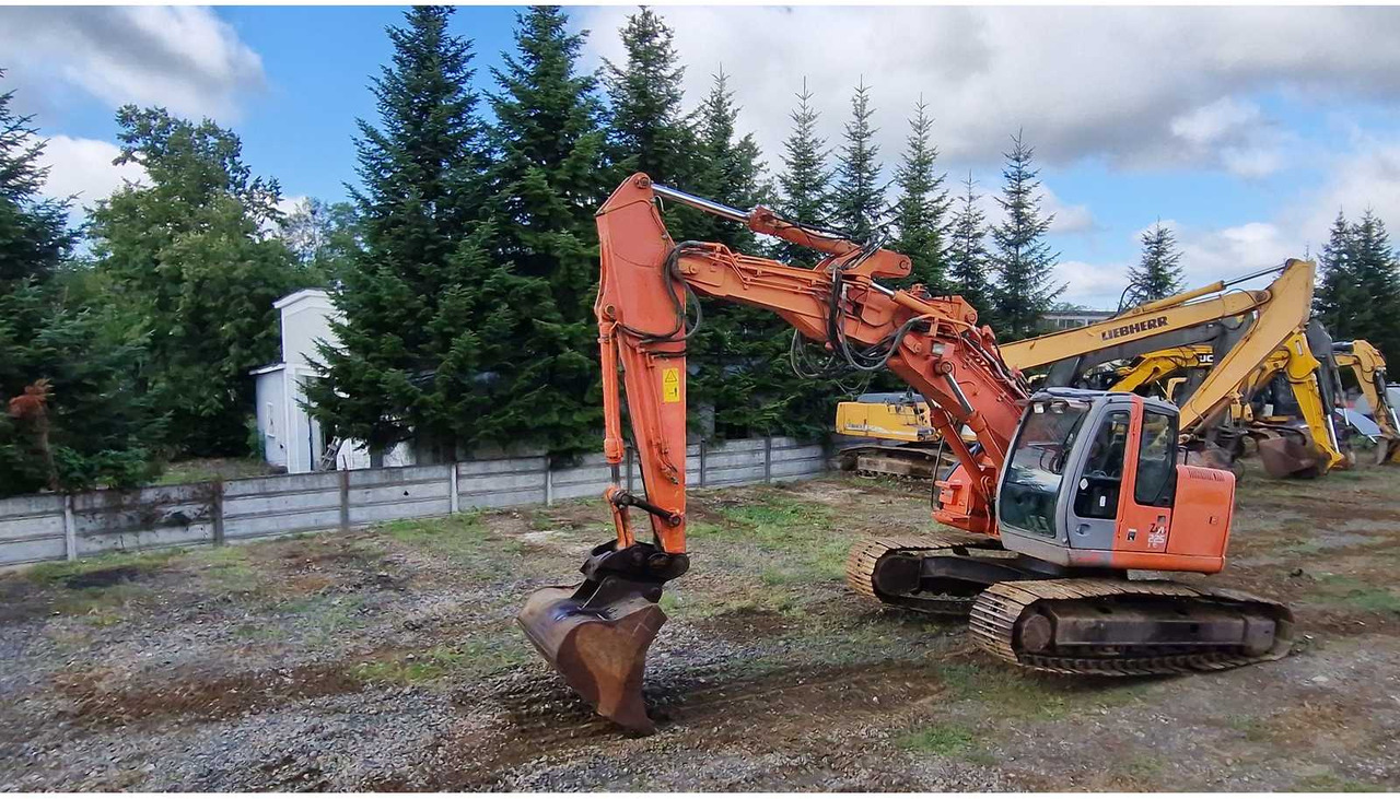 HITACHI ZX225USLC - Ekskavator me zinxhirë: foto 4 HITACHI ZX225USLC - Ekskavator me zinxhirë: foto 4
