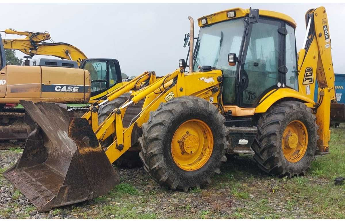 JCB 4CX - Fadromë me shkarkim nga prapa: foto 5 JCB 4CX - Fadromë me shkarkim nga prapa: foto 5