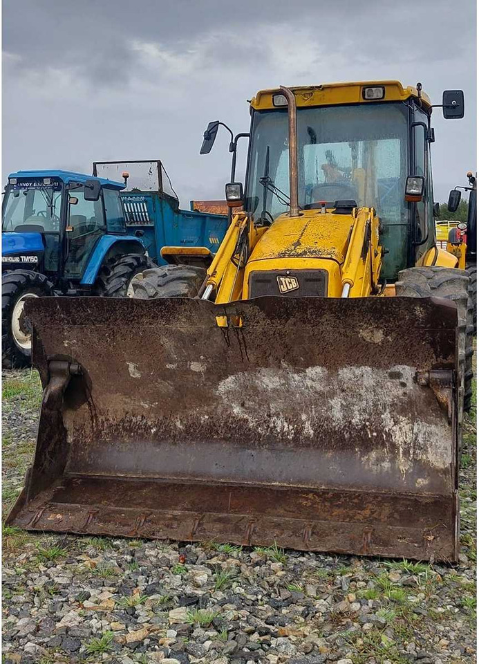 JCB 4CX - Fadromë me shkarkim nga prapa: foto 3 JCB 4CX - Fadromë me shkarkim nga prapa: foto 3