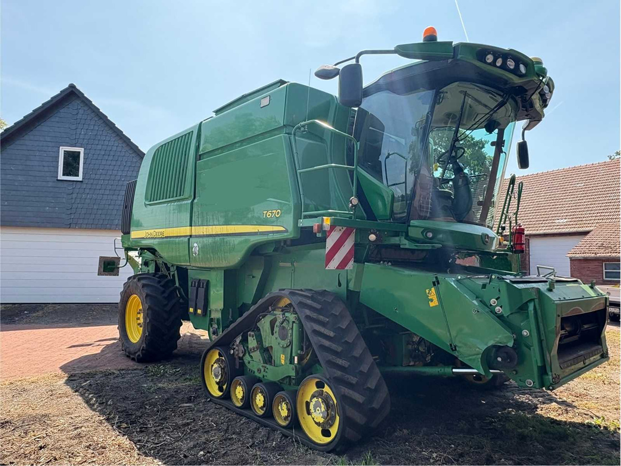 John Deere T670 - Autokombajnë: foto 1 John Deere T670 - Autokombajnë: foto 1